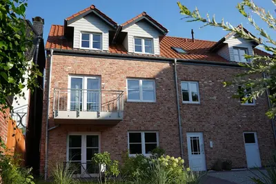 Image de Vacation apartment \"Norderhus\" (Wh2) with 70sqm - quiet central location - with balcony