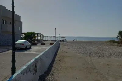 Image de Big cozy apatrtment with private garden, 50ft from beach, 10 min from airport