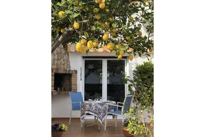 Image de Maison de charme rénovée - 4 mn à pieds plage Grifeu - Très beau jardin-Parking
