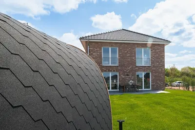Image de Your home by the sea - luxurious, sauna, bioethanol stove, parking lot