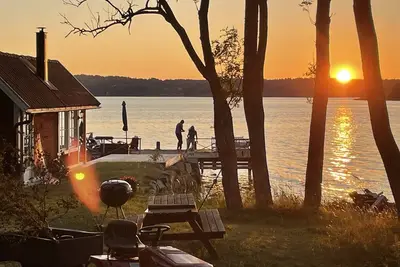Image de Seaside century house with beautiful sunset and big jetty with sauna