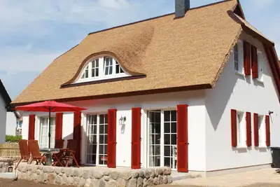 Image de Fantastic apartment in a thatched house (ground floor) with large terrace and child-friendly garden
