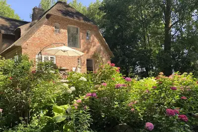 Image de Maisonettewohnung mit Privater Gartenterrasse mit Blick in Parkartigen Garten