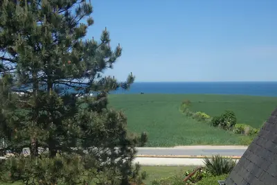 Image de Maison face à la mer, avec piscine et Spaomaha Gites
