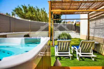 Image de Magnifico apartamento com jacuzzi privado.