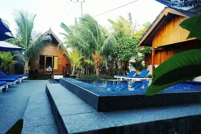 Image de Beachfront Cottages with pool view