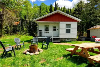 Image de New! Chalet with spa in the forest- Nature awaits!