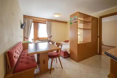 Image de Simple, yet traditional. The two-room apartment at Residence Livigno will leave