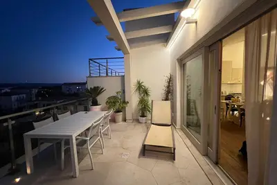 Image de Beautiful penthouse close the main street of Olbia.