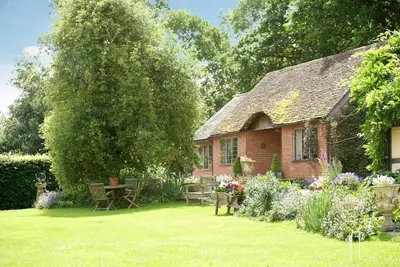 Image de Long Cover Cottage is 4 Star Gold retreat from the outside world.