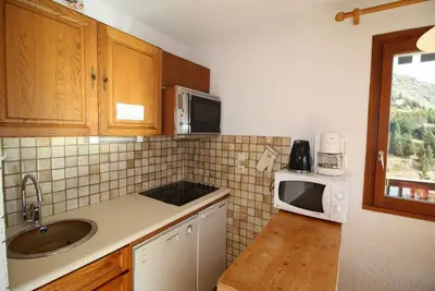 Image de Pied des pistes de ski, Rez-de-chaussée, vue panoramique, balcon, casier à ski, 40m²