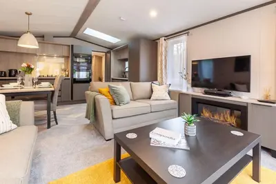 Image de Wildwood - modern Kelling Heath caravan
