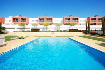Image de 40% Off! Ground floor apartment with terrace, Bbq, Ac, WiFi fiber, 3 swimming pools, garden