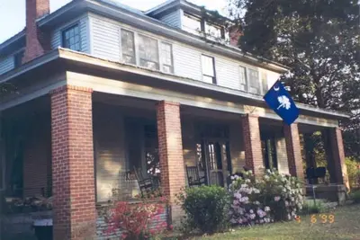 Image de Stately 2-story historic home maintains original charm and charater.