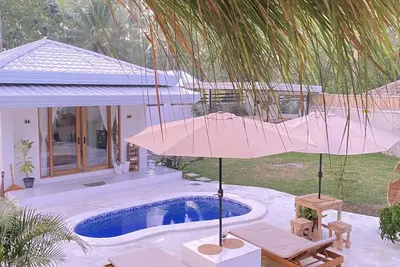 Image de A Tropical Hideaway. 15mins drive from the city.