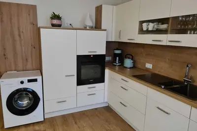 Image de Vacation apartment for families with playroom and terrace, near leisure park