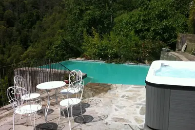 Image de Gîte dominant deux vallées, dans un parc avec spa, piscine, trampoline barbecue