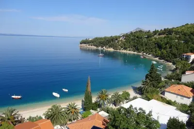 Image de Apartment B - 50m from the beach and center. Quiet location with sea view.