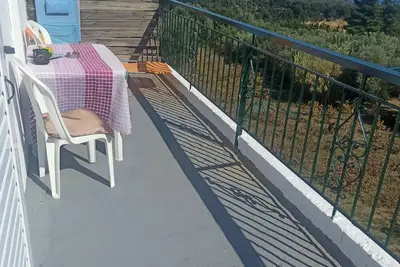 Apartment above Peroulia beach near Koroni - taverna in front of the house