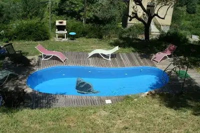 Image de Appartement avec terrasse dans superbe chalet de pierre et bois