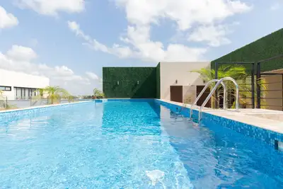 Image de Modern Condo in Lush Aldea Zama, Tulum! Rooftop pool, gym, concierge