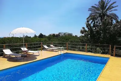 Image de Villa Dianto: A welcoming two-story apartment that is part of an ancient country house surrounded by a citrus garden, with Free Wi-Fi.