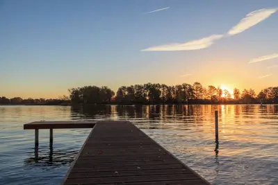 Image de House on the Havelbogen directly on the water with canoe and jetty, terrace apartment*****