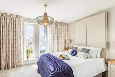 Image de Luxury 5 bedroom home with onsite parking and Wifi