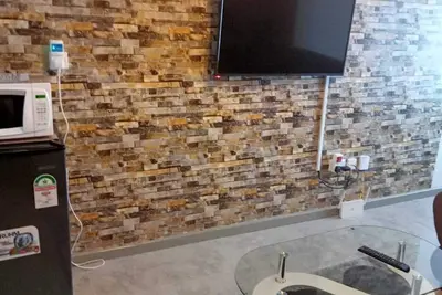 Image de A rustic 1 Br Apt -10mins from the airport