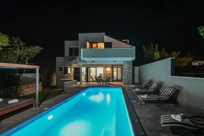 Image de Maison de vacances Novalja pour 1 - 7 personnes avec 2 chambres à coucher - Maison de vacances