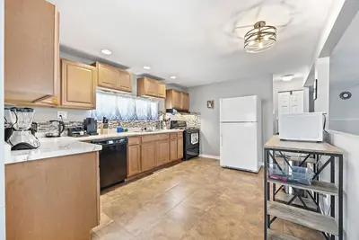 Image de 3bd/1. 5bath entire home/Game room/Office/extended stays/Free Wifi & Parking
