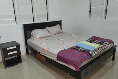 Master Bedroom with Shared Kitchen and Living Room