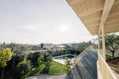 Image de Villa \"Cavalino Boutiquehouse\" avec vue sur le lac, piscine et Wi-Fi