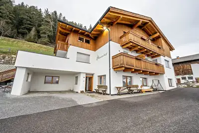 Image de Appartement \"Maurerhof Abendrot\" avec vue sur les montagnes, terrasse privée et Wi-Fi.