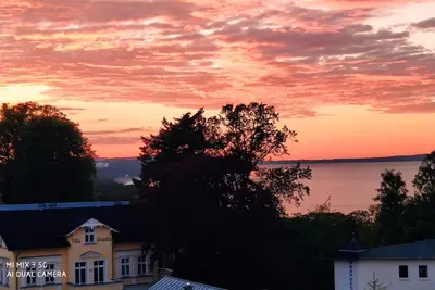 Vacation apartment evening meal with sea view