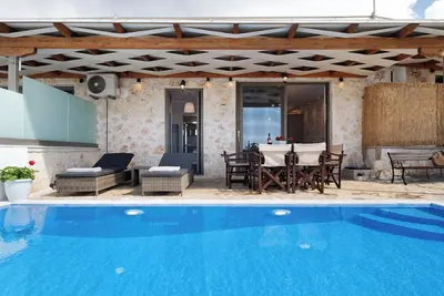 Image de Appartement \"Suite Iro\" avec vue sur la mer, Wi-Fi et climatisation.