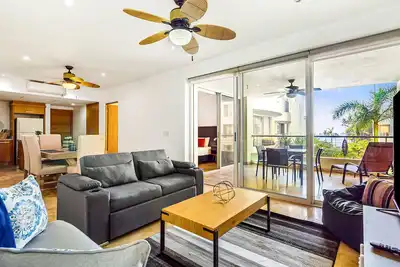 Modern ocean-view stay with pool and rooftop access, large balcony, and Ac