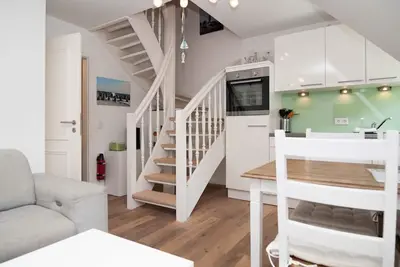 Image de Apartment on 2 levels with a small roof terrace.