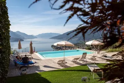 Image de \"Residence CaFelicita – Lake-view apartments, infinity pool & jacuzzi to relax! \"