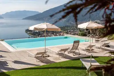 Image de \"Residence CaFelicita – Lake-view apartments, infinity pool & jacuzzi to relax! \"