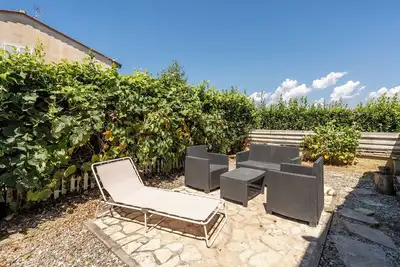 Image de Villa 'Villetta Tiziana' avec terrasse privée, Wi-Fi et climatisation.
