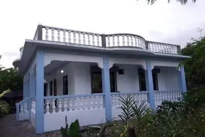 Image de Villa Rivero is a beach front house 50 feet away from the beach.