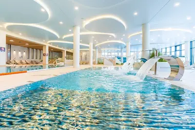 Image de Faro Polanki Aqua Schwimmbader, Saunas, Whirpools, 350 m vom Meer
