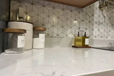 Image de Cozy 4bd 3 bath home 6 miles from Westgate/Stadium!