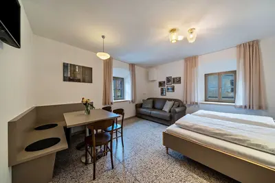 Image de Appartement de vacances \"Domus Faber 4b\" avec vue sur les montagnes, terrasse partagée et Wi-Fi.