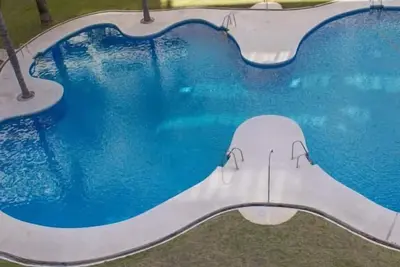 Appartement avec terrasse, parking et piscine