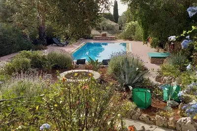 Image de Villa set within private courtyard surrounded by mature olive trees