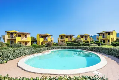 Image de Appartement \"Corbezzolo\" avec vue sur la piscine, piscine partagée et climatisation