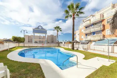 Image de Appartement 'Esbamar Vi' avec piscine partagée, Wi-Fi et climatisation.