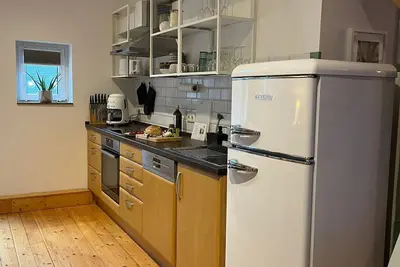 Image de FeWo Unikate, living under thatch